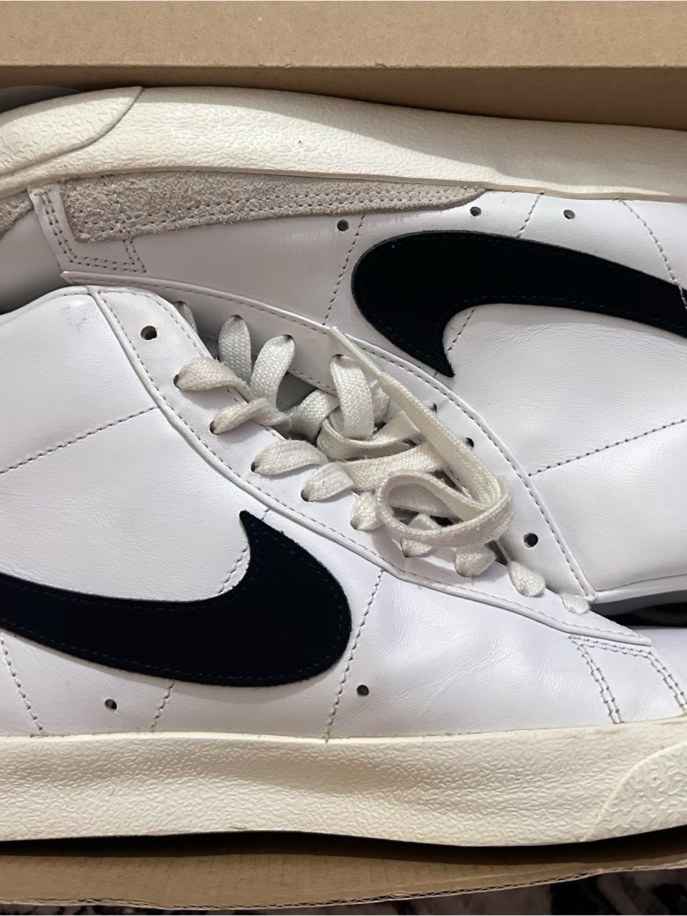 Nike Women's White Leather Sneakers with Black Swoosh